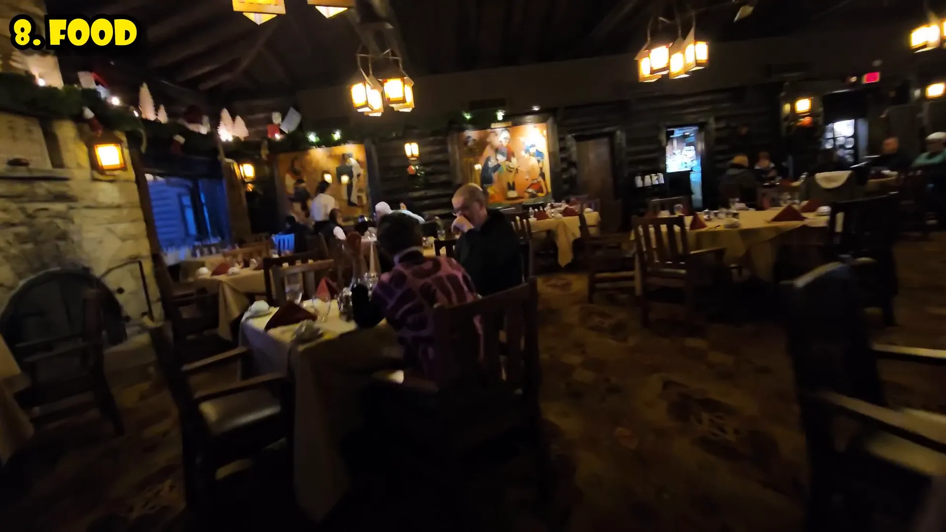 Interior of El Tovar Dining Room with windows overlooking the Grand Canyon