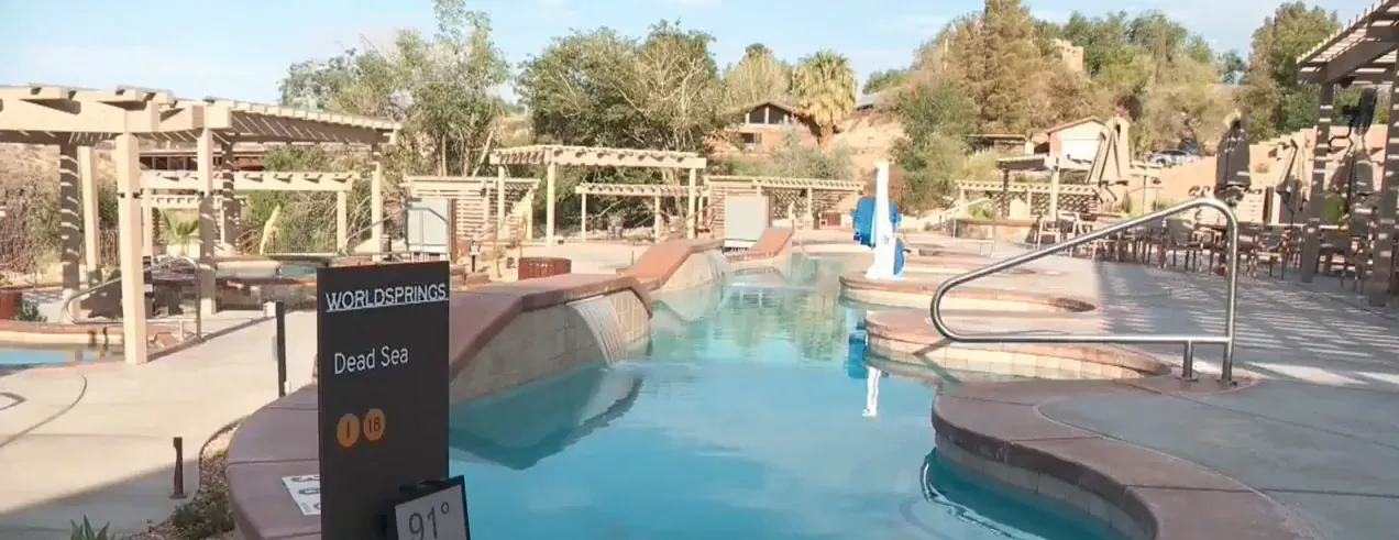 Guests soaking under the stars at Zion Canyon Hot Springs during evening hours