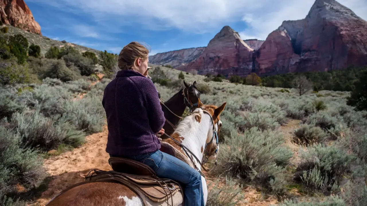 Horseback riders exploring scenic trails near Zion National Park