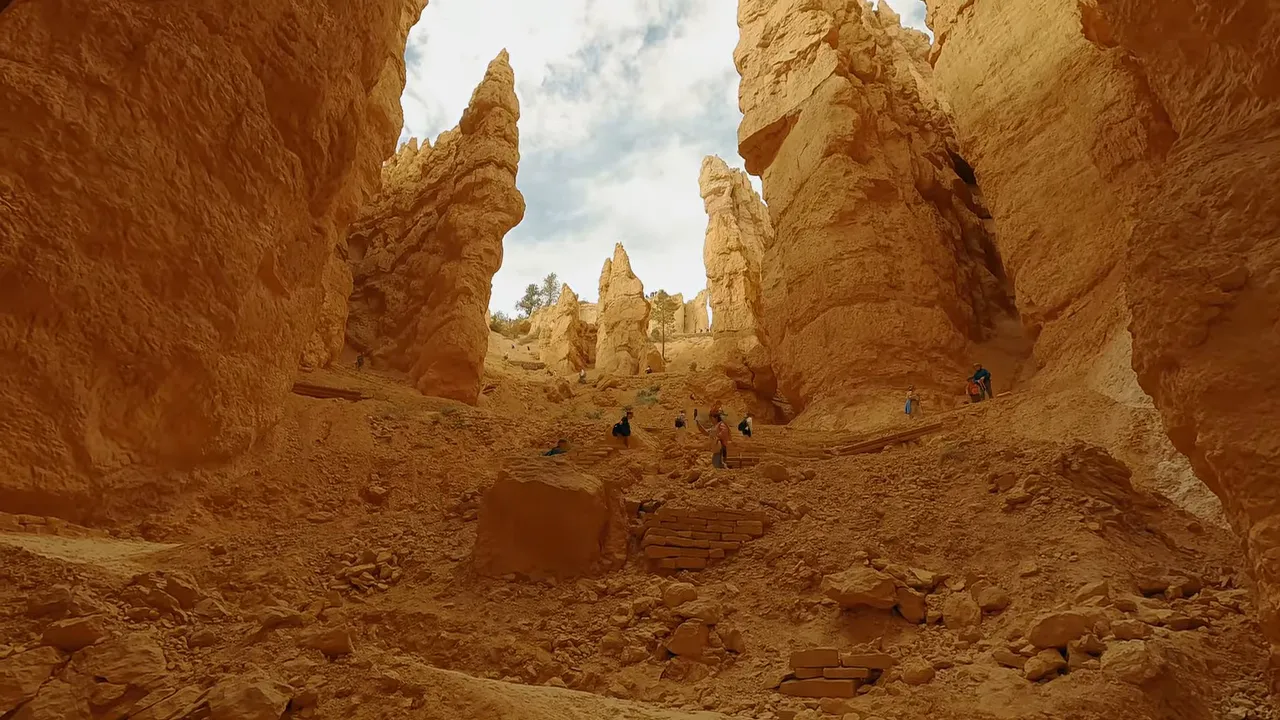 Navajo Loop trail with towering hoodoos and switchback steps in Bryce Canyon